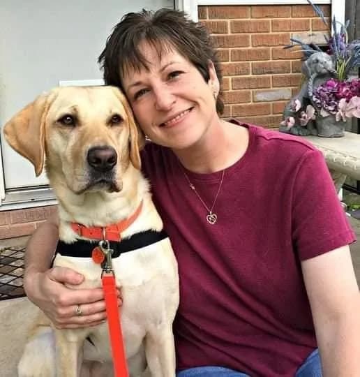 Jennifer Warsing with her service dog
